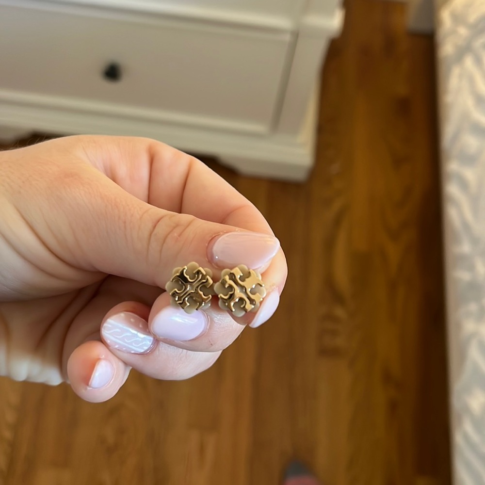 Tory Burch stud earrings. Good with cream/beige back
